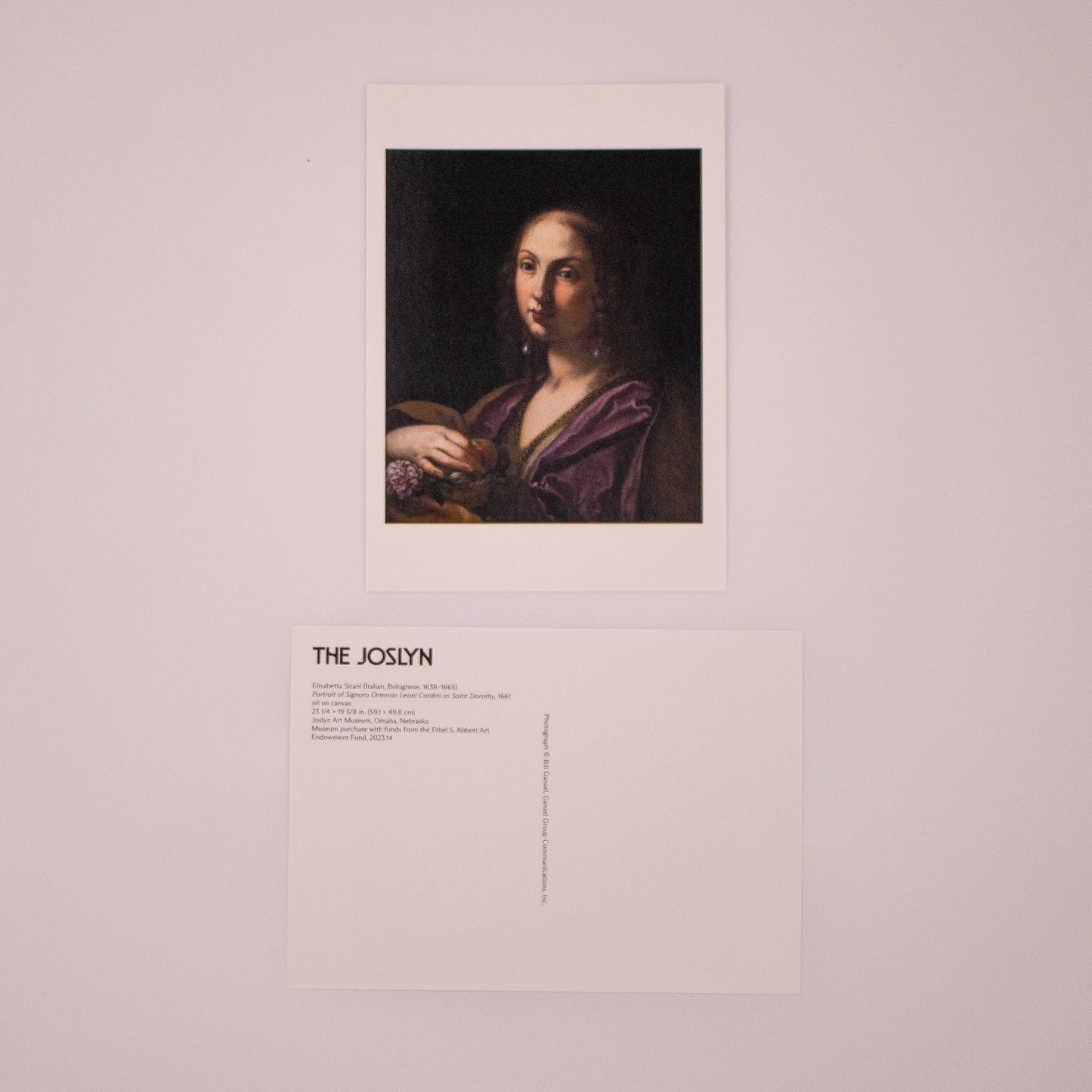 Elisabetta Sirani - Portrait of Signora Ortensia Leoni Cordini as Saint Dorothy Postcard